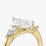 Pear Cut - Plain Band - Three Stone Ring - 0.25 Ct Side Stone each - 18 K Gold